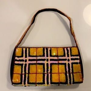 EMMA BERNHARDT LONDON Tartan pattern in orange and black sequins